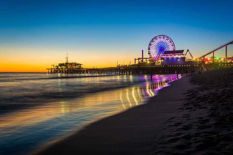 The Santa Monica Pier at sunset, in Santa Monica, California.